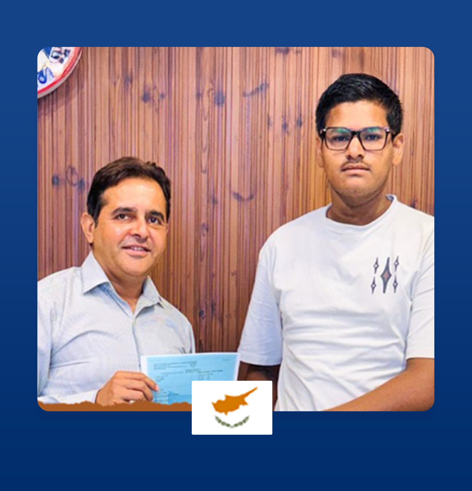 Graduating students with VISA sign